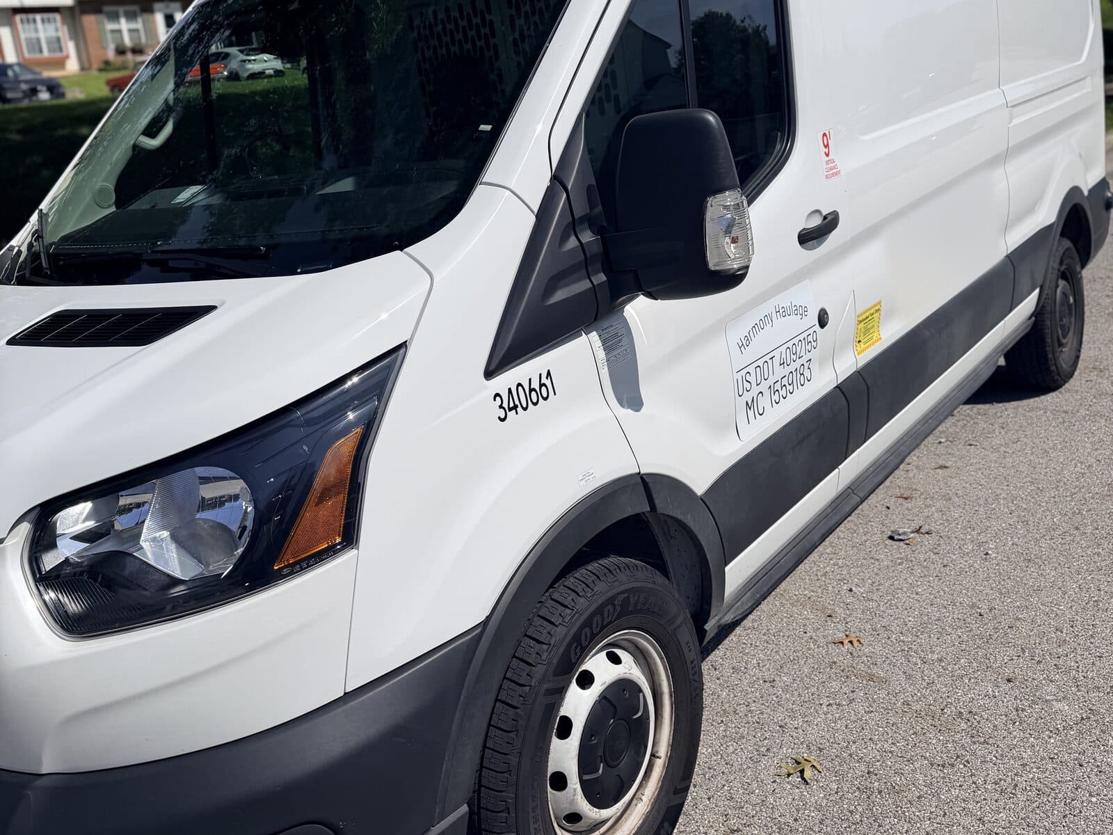 Side profile of the Harmony Haulage high-roof cargo van.